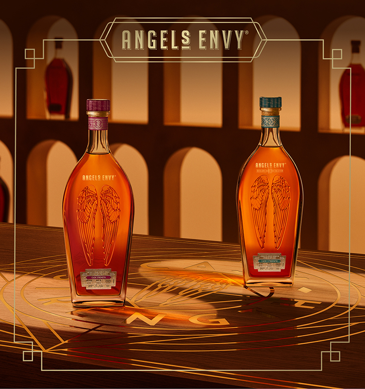 Angel’s Envy 10 Cask Strength Rye and 2026 Cask Strength Bourbon bottles displayed together on a logo-engraved table in the Cask Archives and a golden art deco border featuring the words “Angel’s Envy.” 